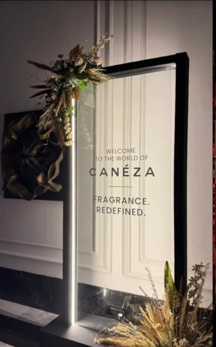 Welcome to the World of Canéza sign: Fragrance. Redefined.